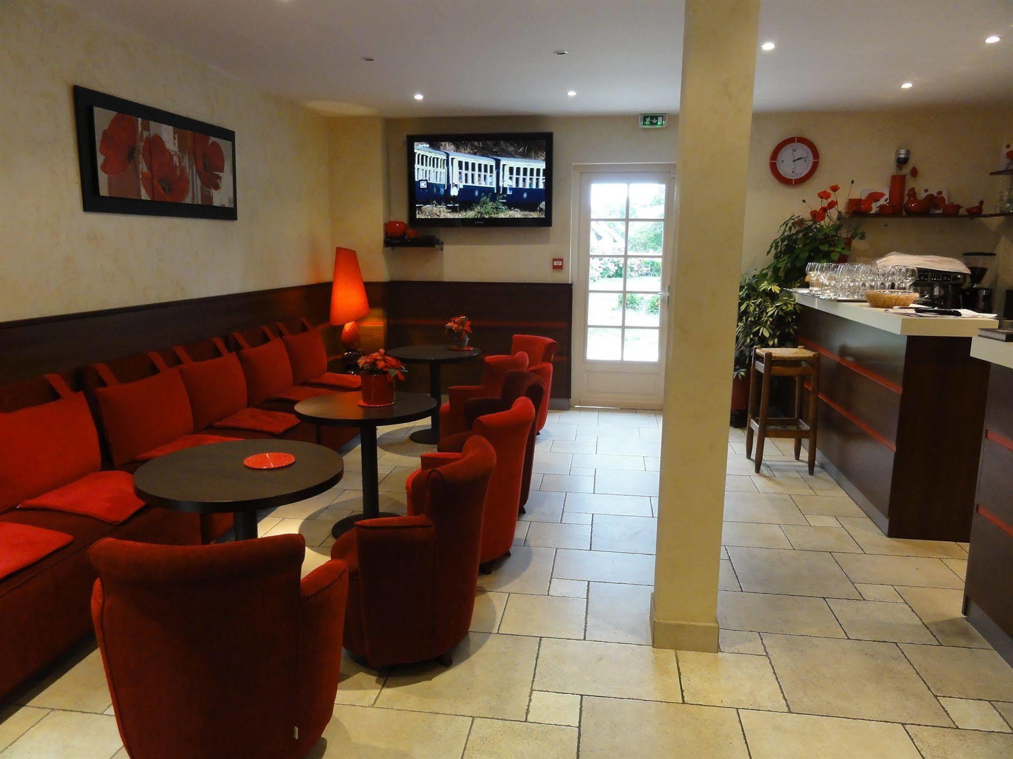 Hotel Restaurant Les Coquelicots, The Originals Relais Saint-Pardoux-l'Ortigier ร้านอาหาร รูปภาพ